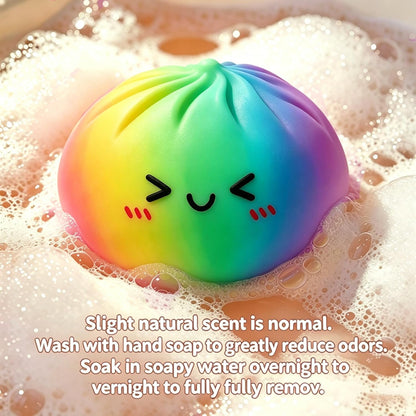 Soft silicone glitter dumpling squishy showing sparkly sheen and cute smiling face detail
